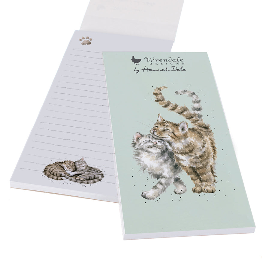 shopping list notebook with a pale green cover and illustration of 2 cats cuddling together.  The open pages show a litltle cat illustration on the bottom of each lined page