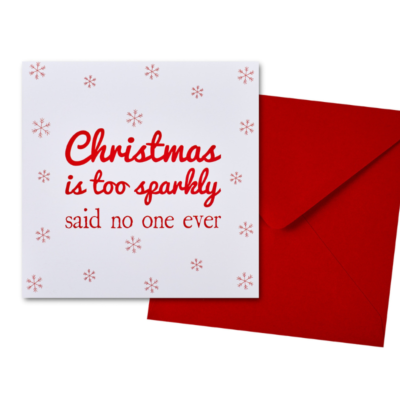 red and white single christmas card with red envelope with words Christmas is too sparkly said no on ever.