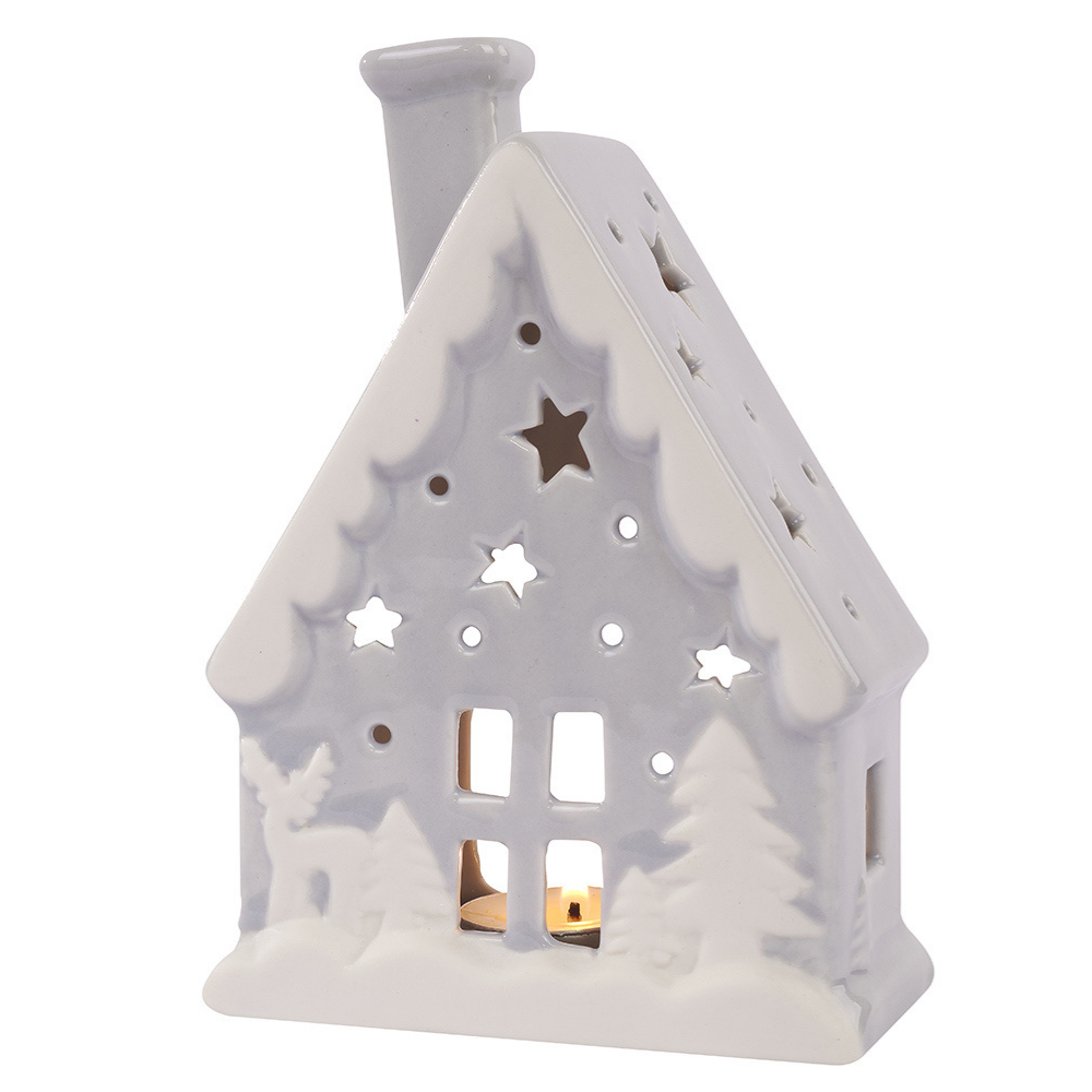 grey and white glazed ceramic house shaped tealight candle holder with cut out stars and a white deer and christmas tree on the front.