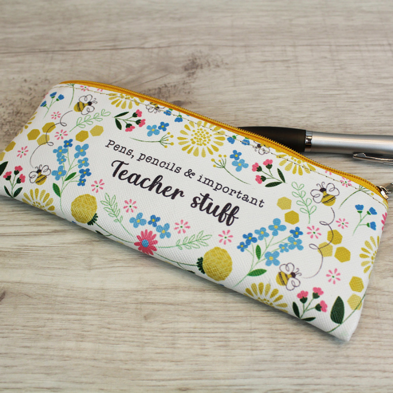 Teacher Stuff pvc pencil cases with flower and bee design on the front and the back.  The pencil case features the words, pens, pencils and important teacher stuff on the front
