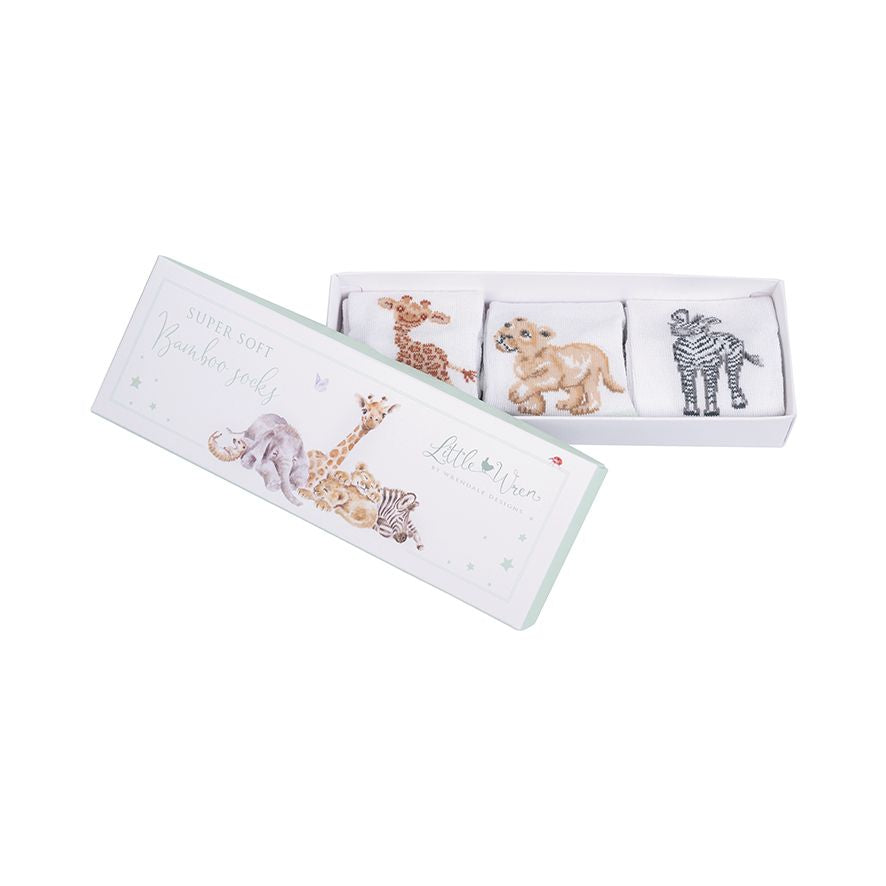 baby sock gift box from wrendale designs with 3 pairs of sock in box.  Each sock has a picture of an animal. a giraffe a lion cub and a zebra