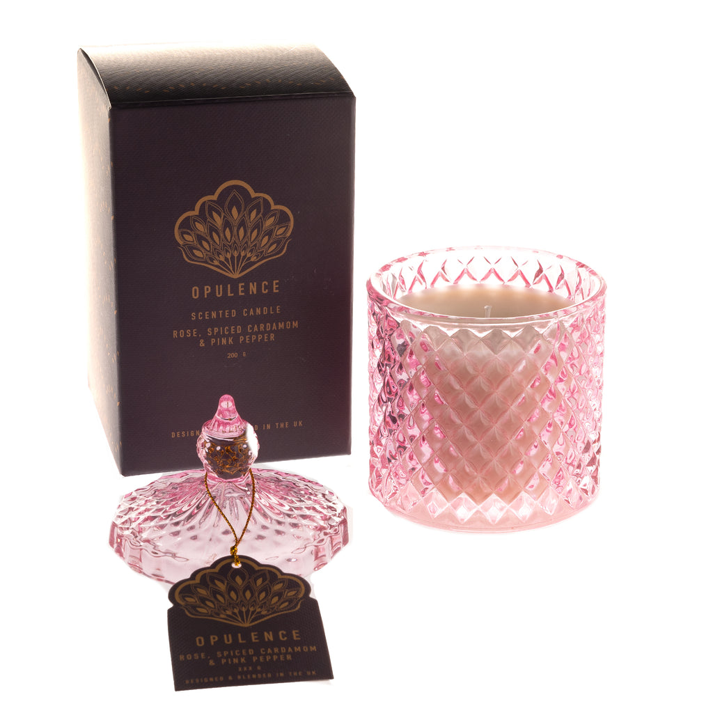 scented candle with rose, spiced cardamon and pink pepper in a decorative, vintage style pink reusable glass jar.  Supplied in a box